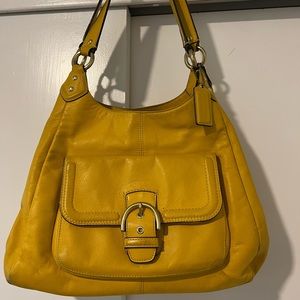 Happy yellow coach, leather purse.